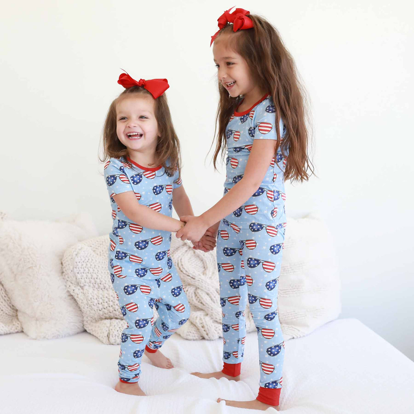 fourth of july matching family pajamas with flag sunglasses