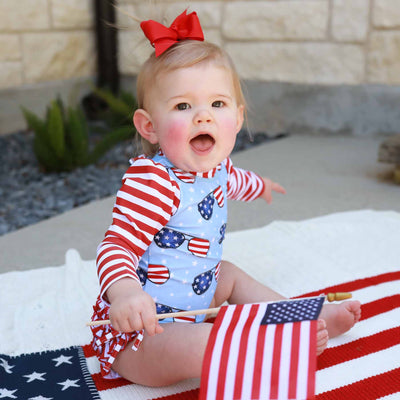 red, white and blue rash guard swimsuit for babies with sunglasses 