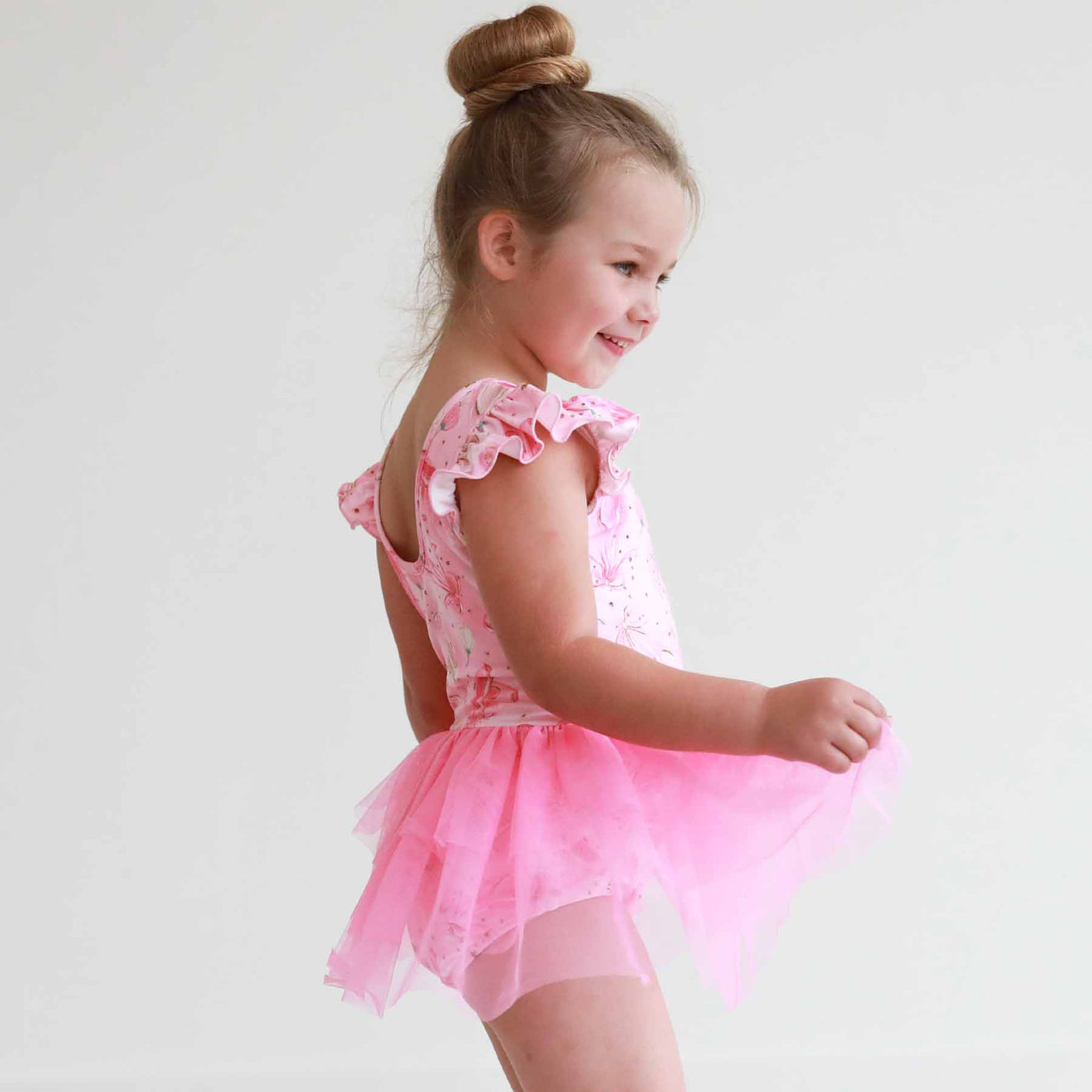 girl leotard with skirt with ballet shoes 