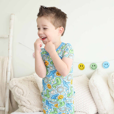 smiley face floatie pajama set for kids blue 