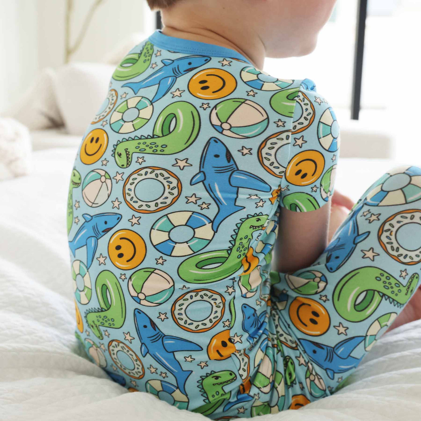smiley face, shark and donut floatie pajamas for boys blue and green 