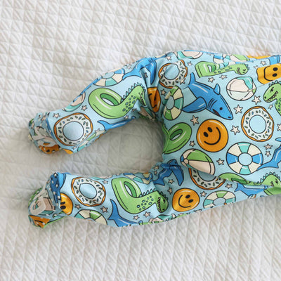 baby footie with blue and green floaties 