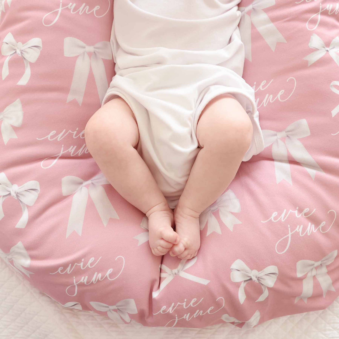 pink personalized swaddle for babies with bows 