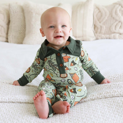 green baby outfit that is camping themed with collar 