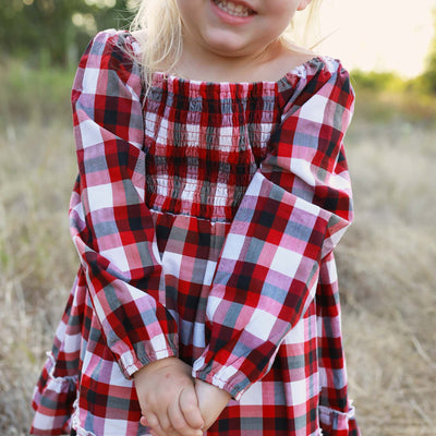 red and black plaid long sleeve smocked dress