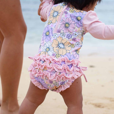 baby rash guard swimsuit with ruffle bottom disco daisies 