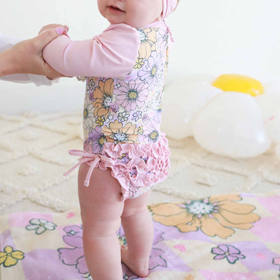 baby swimsuit long sleeve rash guard with ruffle bottom pastel flowers 
