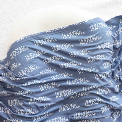 dusty blue personalized baby name swaddle blanket 