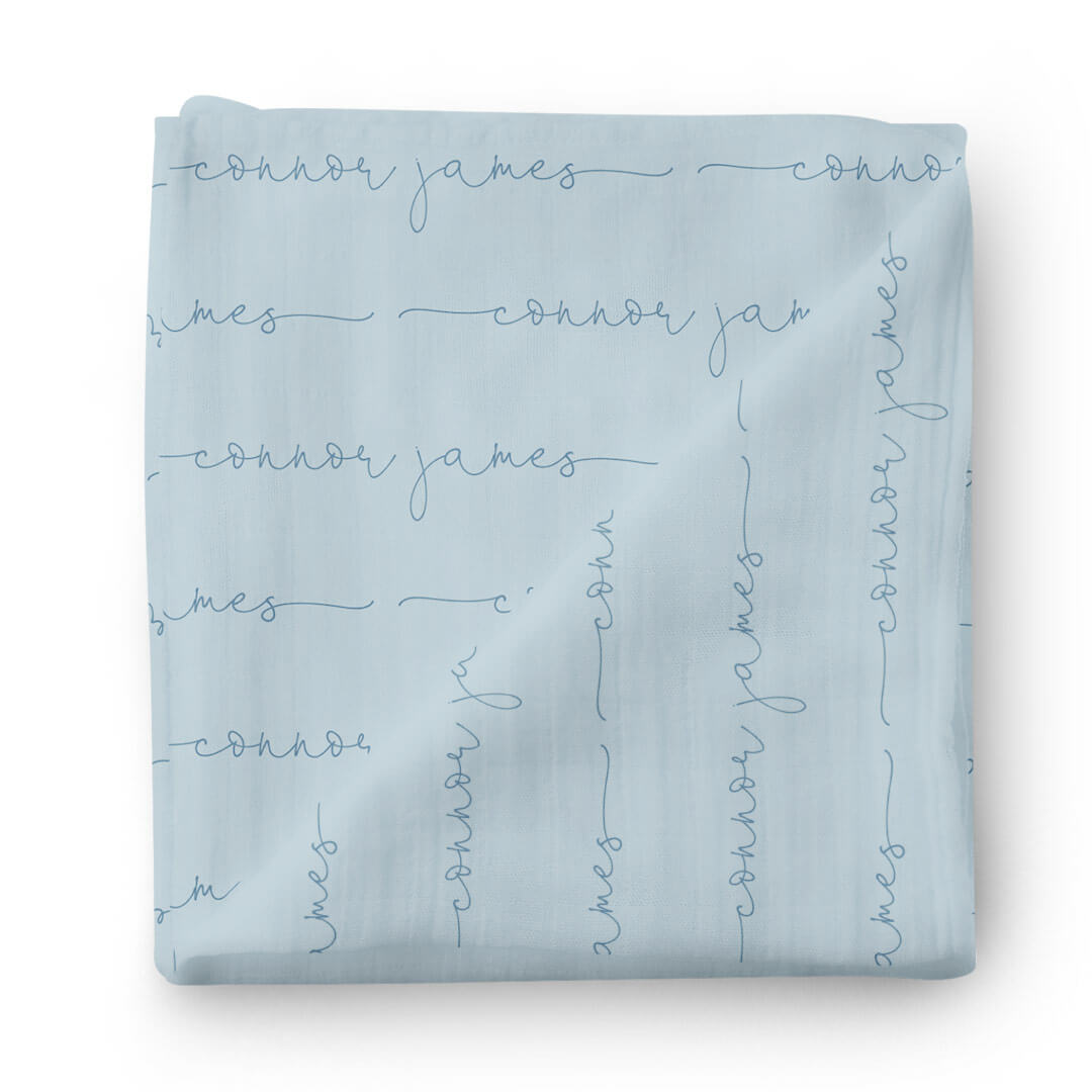 light dusty blue baby name swaddle blanket all script 