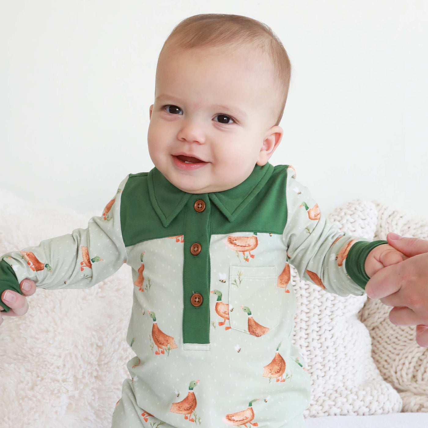 baby pajama romper with collar and ducks green