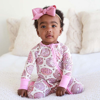 pajama romper made of bamboo with donuts pink 