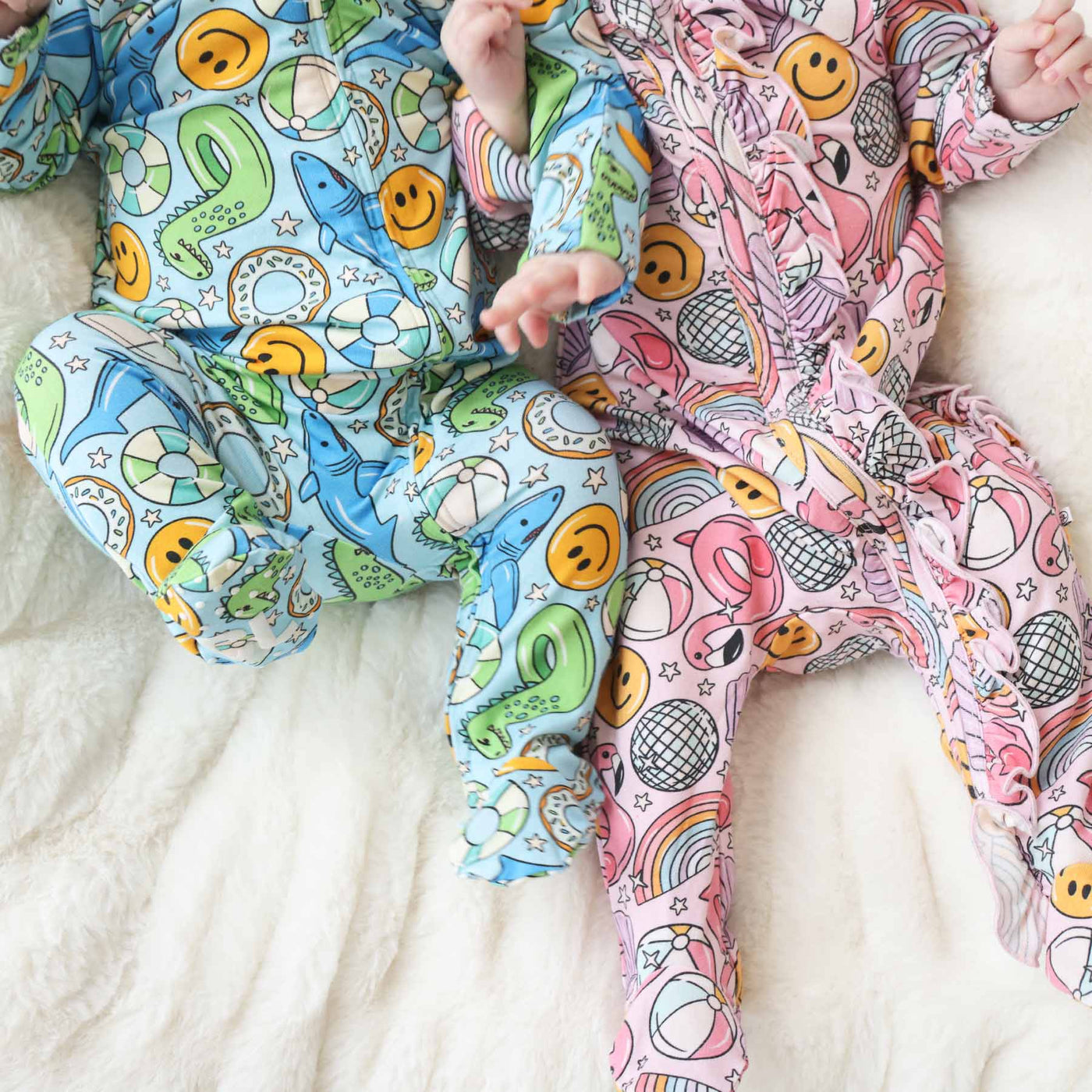 sibling matching footies for baby pink and blue floaties 
