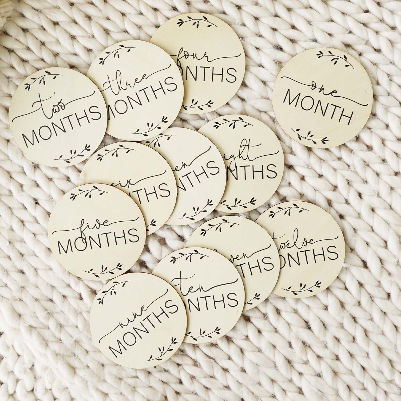 monthly milestone baby photo prop with leaves 