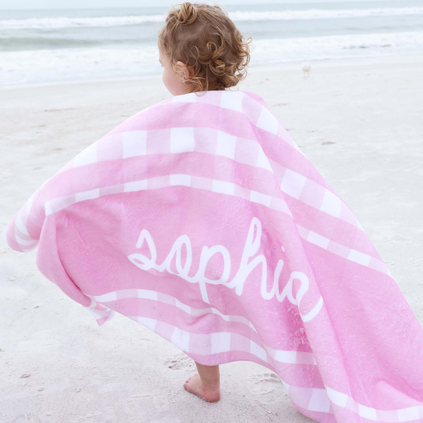 pink seersucker beach towel for kids personalized with name 