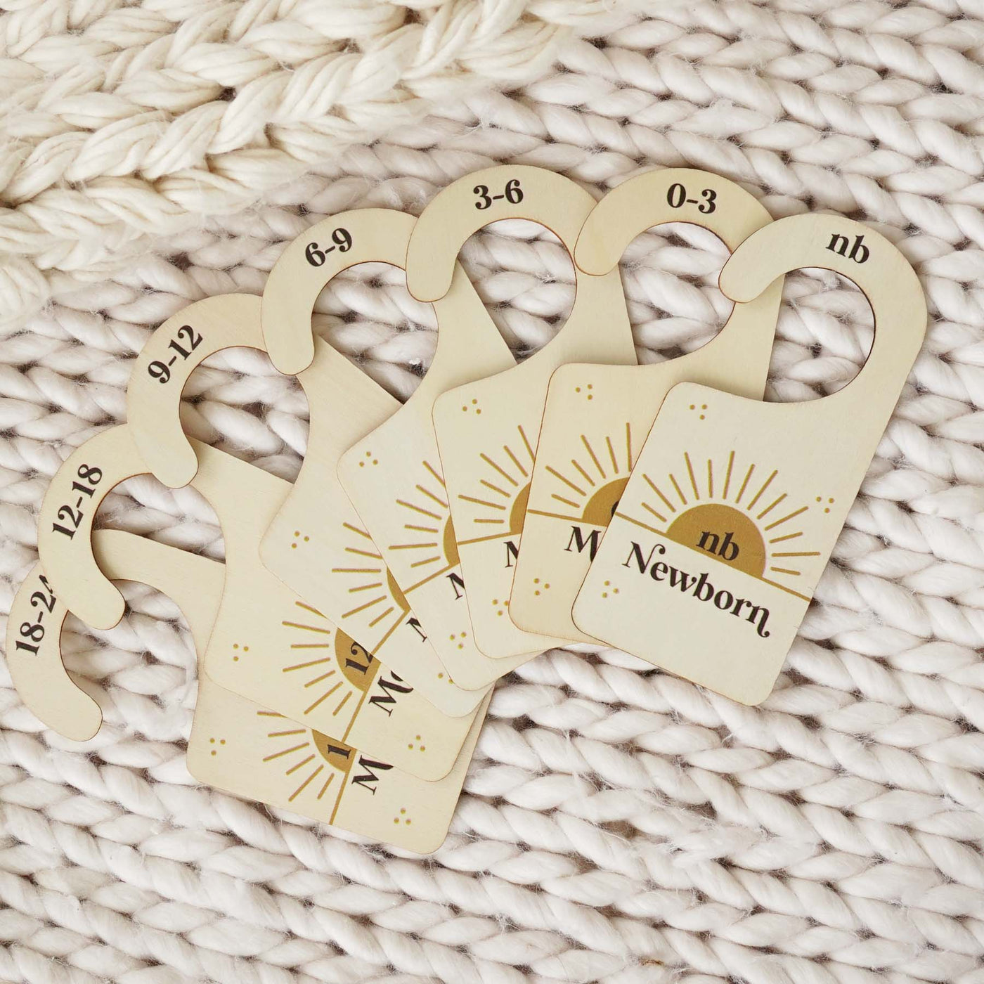 wooden nursery closet dividers with suns 