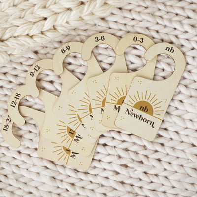 wooden nursery closet dividers with suns 