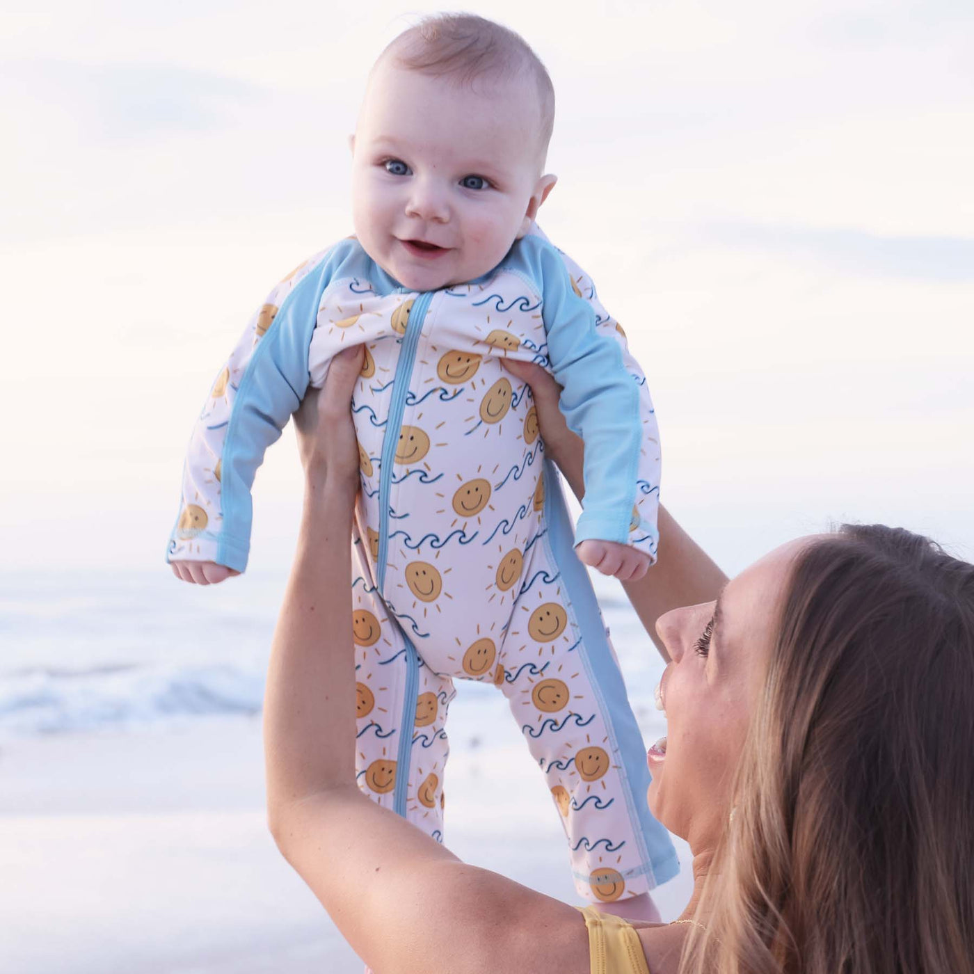 upf 50+ full length rash guard romper for babies with smiley face suns 