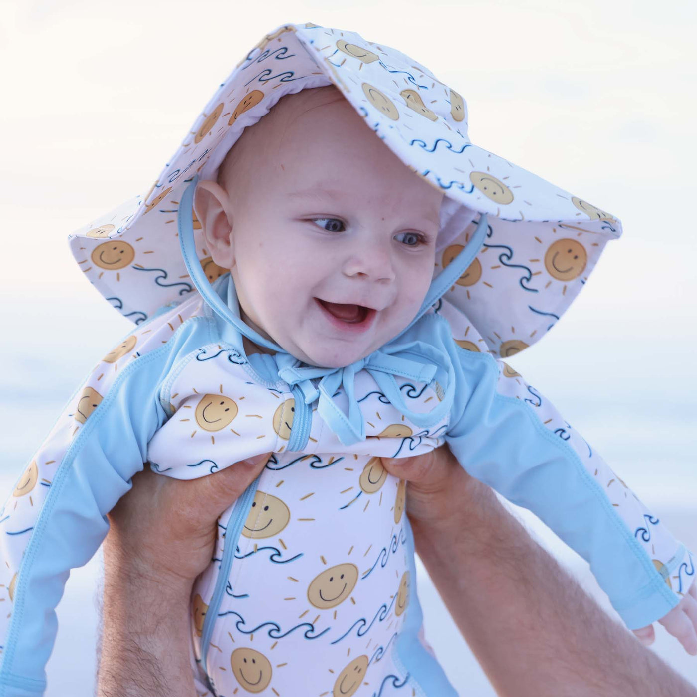 upf 50+ sun hat for babies with suns and waves 