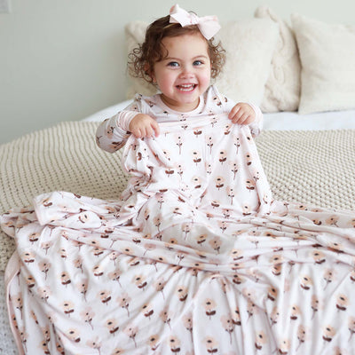 bamboo blanket for kids with muted pink floral