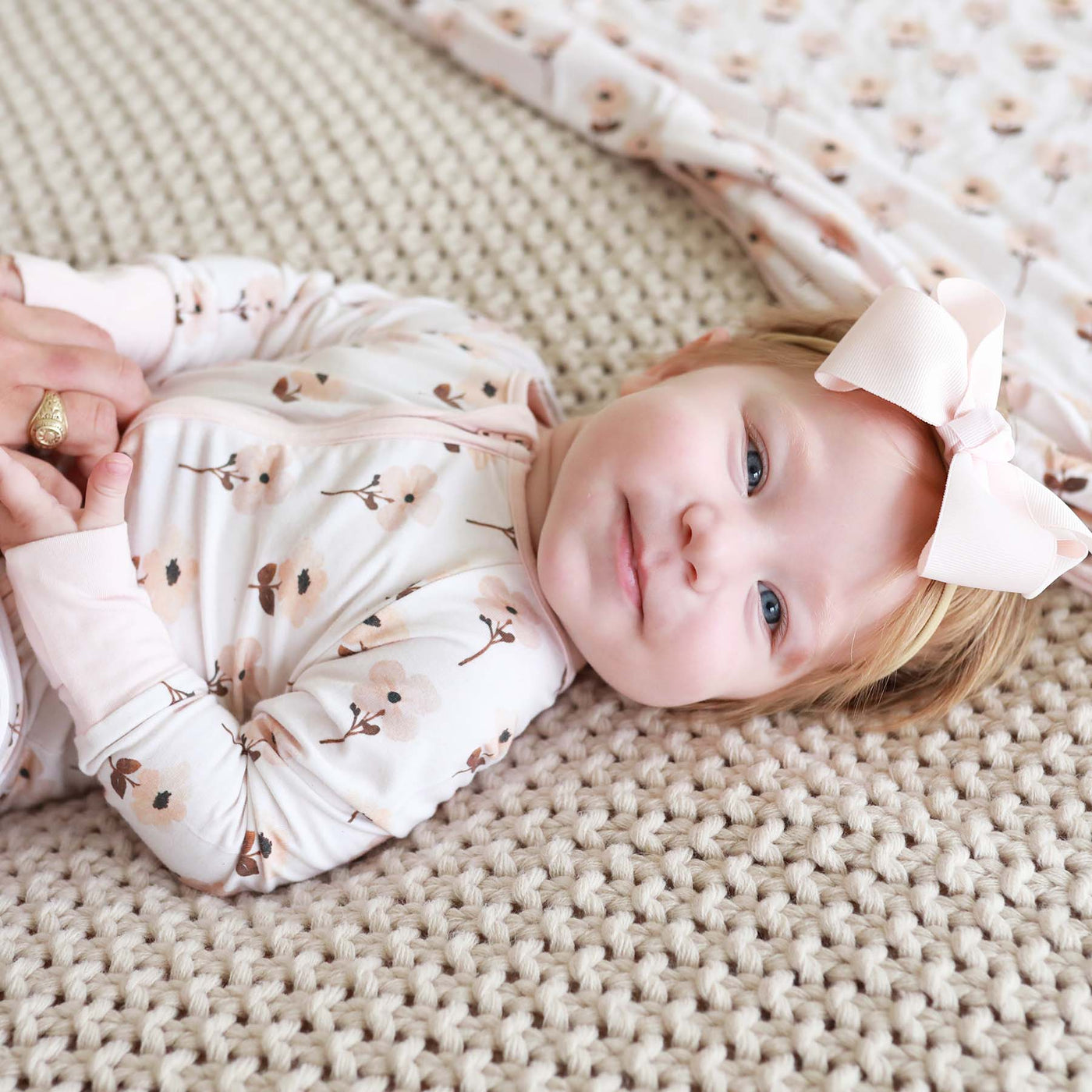 convertible romper pajamas for toddler with muted flowers 