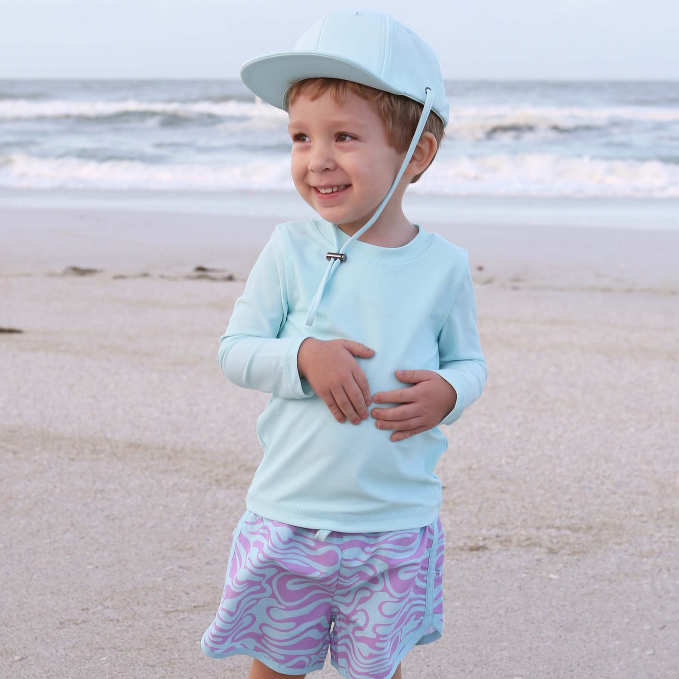 swim trunks for babies blue and purple waves 