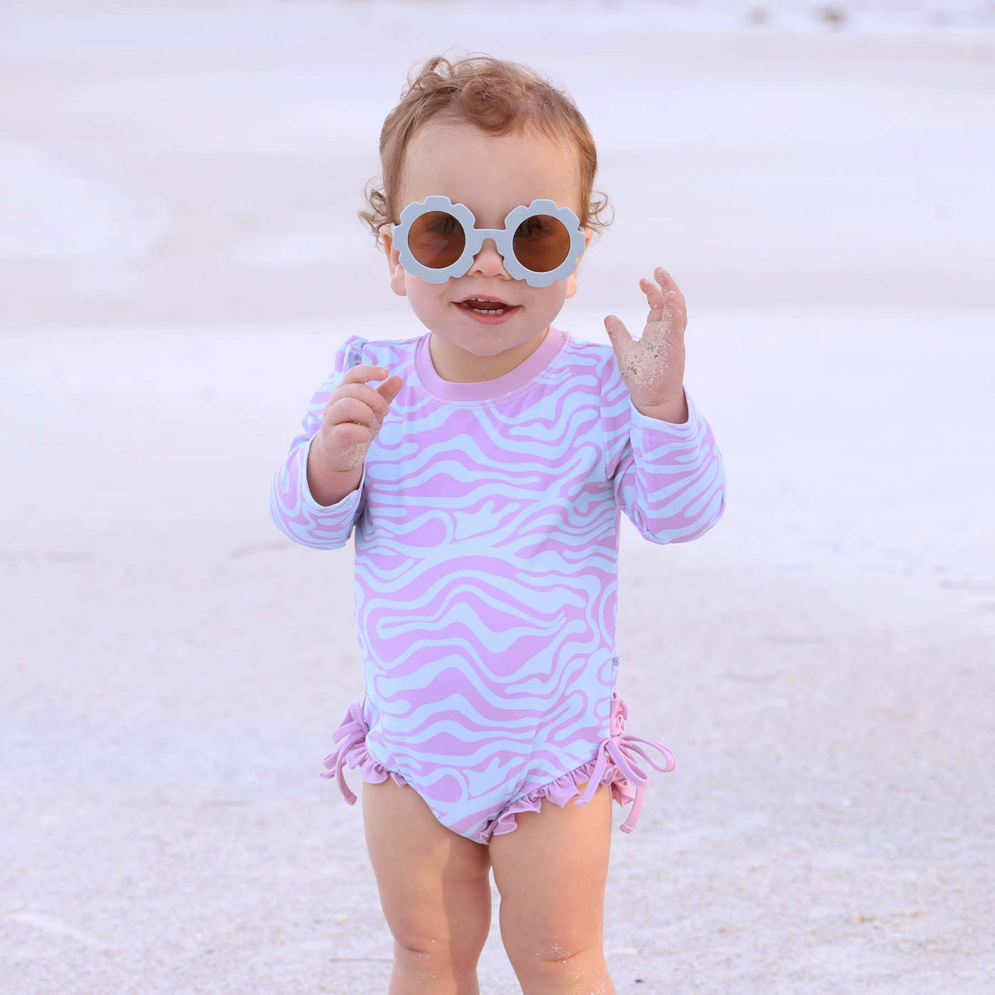 long sleeve rash guard swimsuit for babies with ruffle bottom 