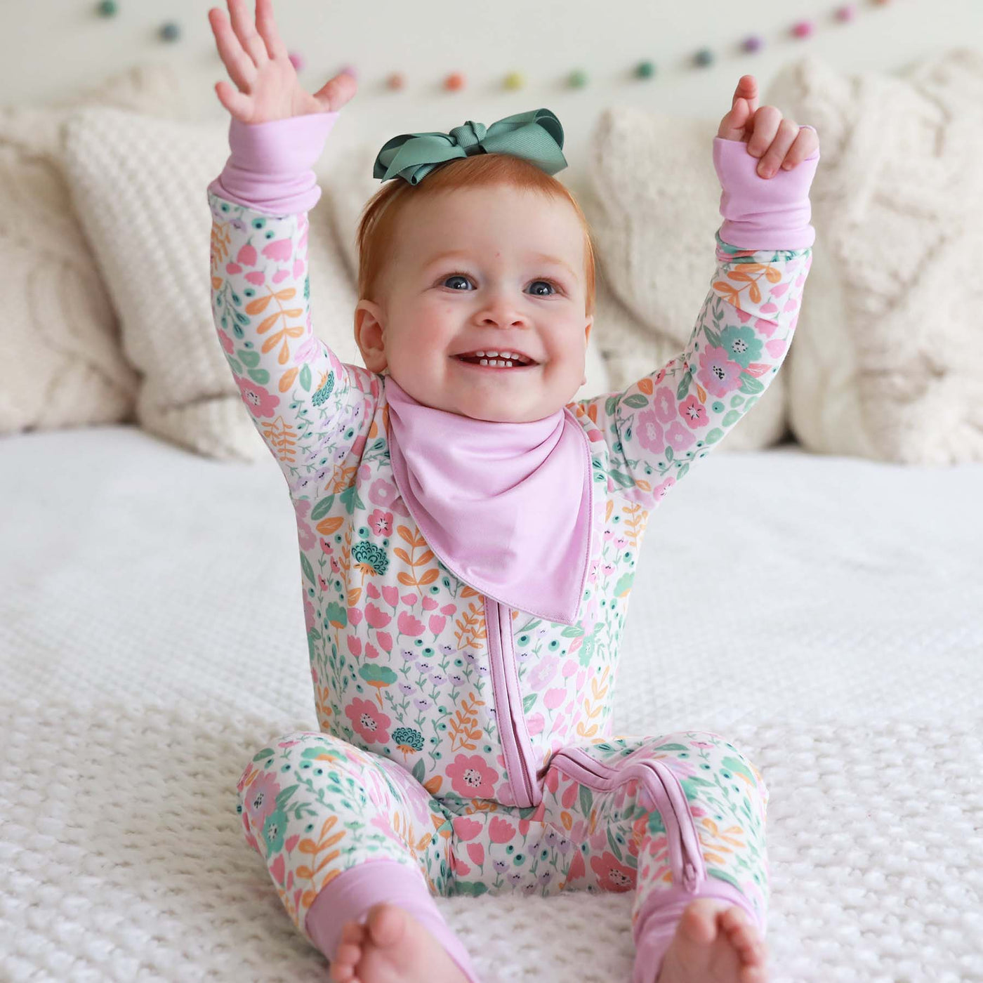 pajama romper for babies with pink and green floral 