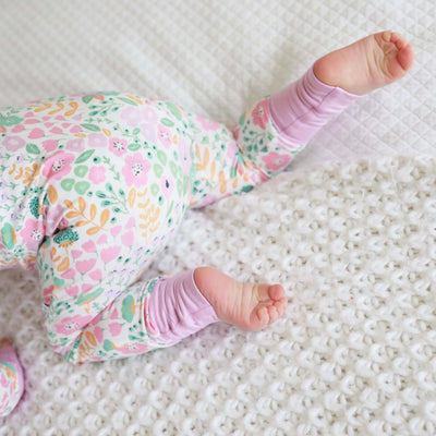 pastel floral pajama romper for babies 