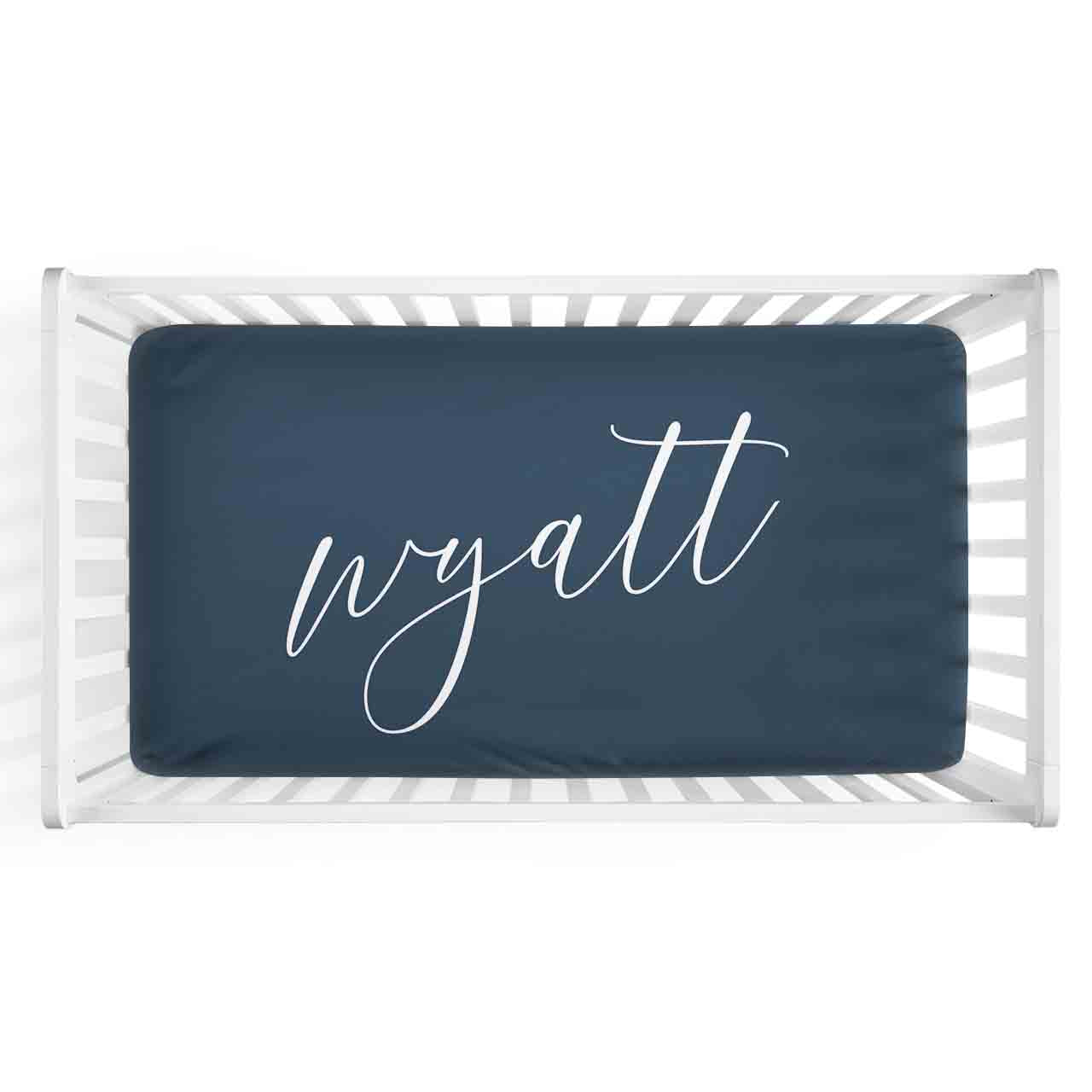 Personalized Baby Name Dark Navy Color Jersey Knit Crib Sheet in Centered Script Style