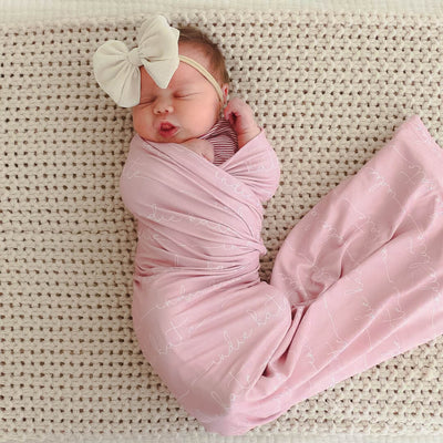 Swaddle vs Sleep Sack For Newborn: Which is Right For Your Baby?