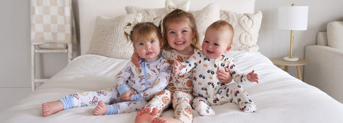Baby, toddler and kid in Caden Lane pajamas
