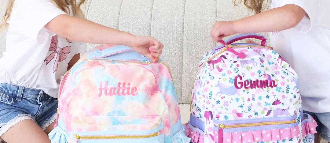 Girls with Caden Lane embroidered backpacks for back to school