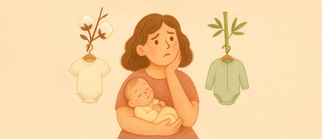 mother with baby choosing between cotton vs bamboo baby clothes
