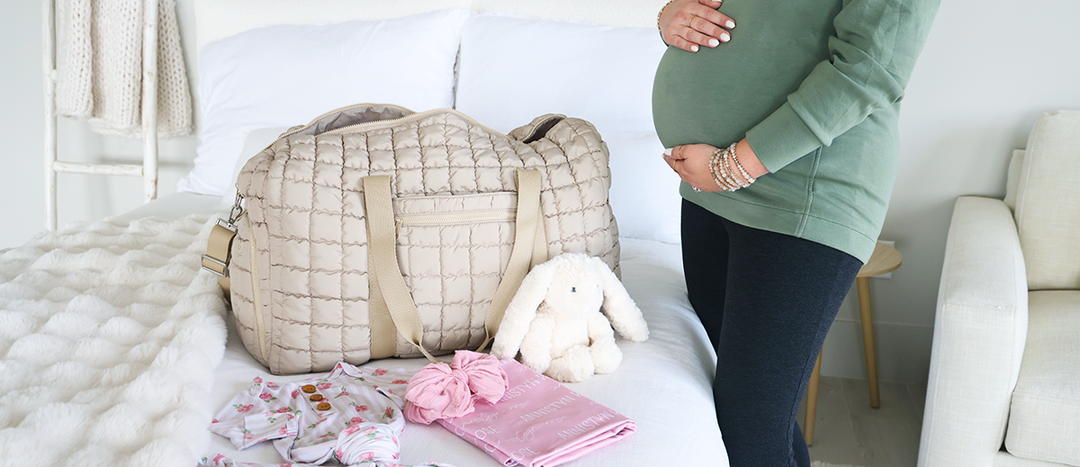 Caden Lane Weekender bag with newborn and mom hospital essentials