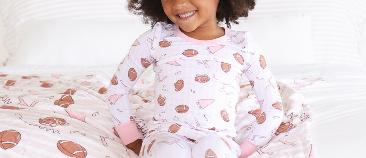 kid wearing sensory-frirendly caden lane bamboo pajamas