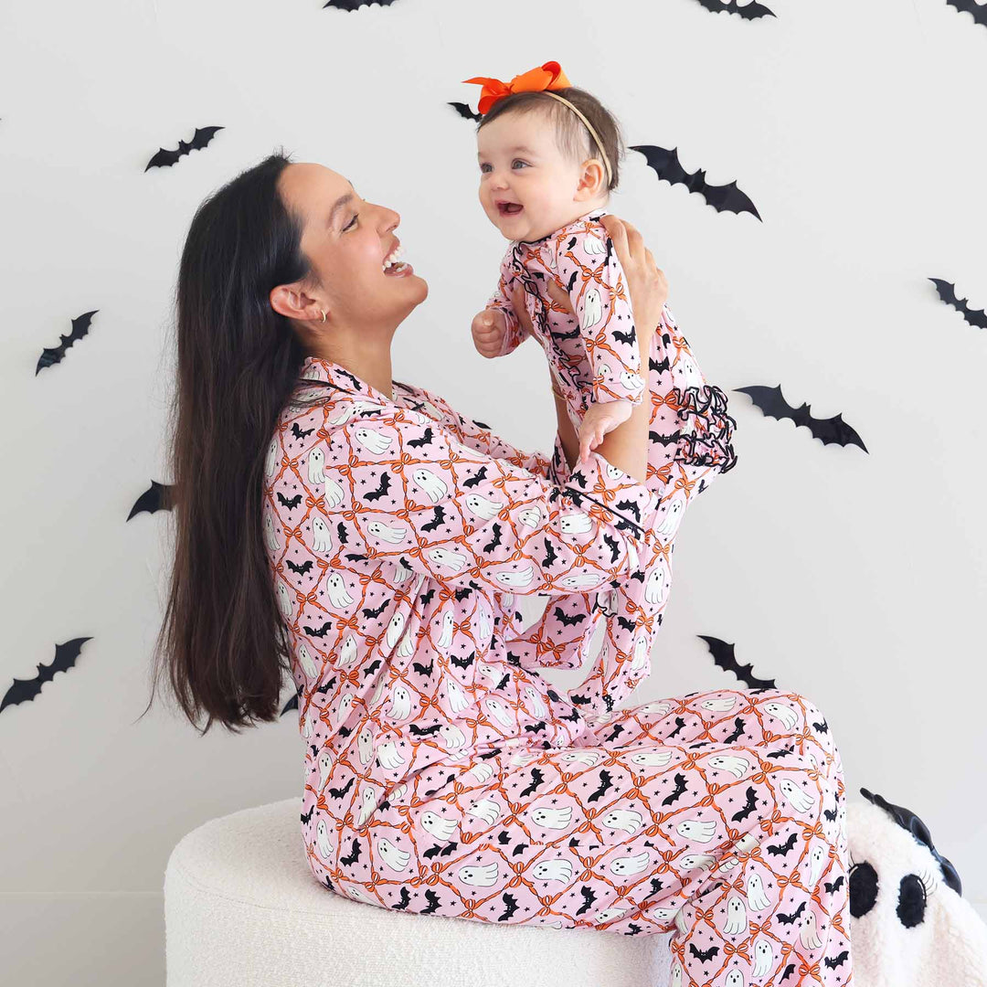 Mom and baby wearing matching Boo Babes pajamas