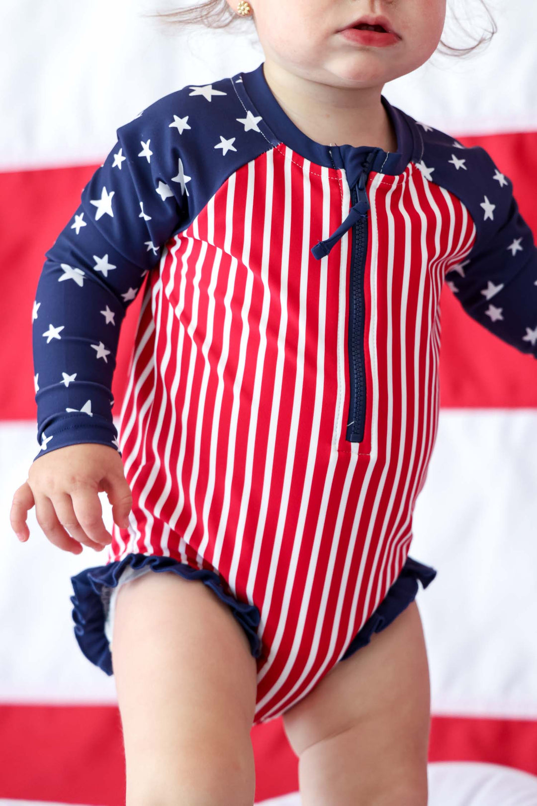 Stars & Stripes Party kids long sleeve rash guard with front zipper detail view 9 | 4th of July kids swim | Caden Lane