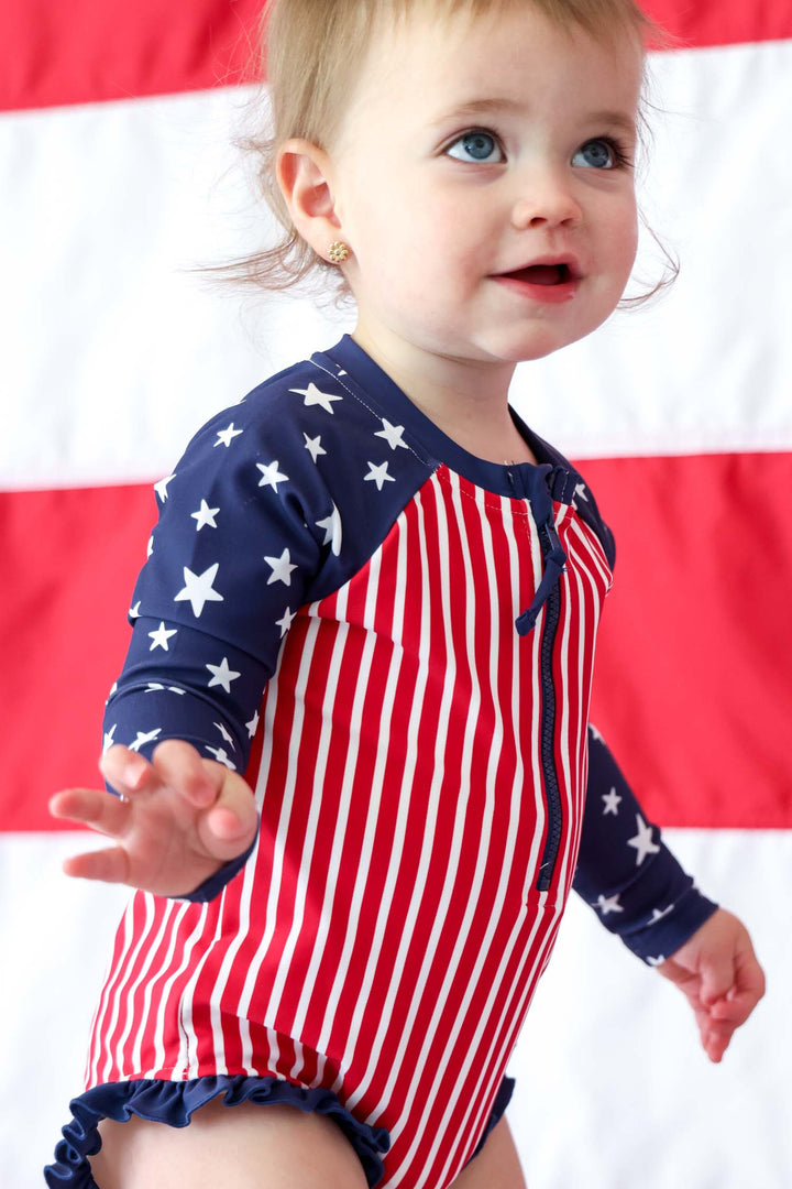 Stars & Stripes Party kids long sleeve rash guard with front zipper detail view 10 | 4th of July kids swim | Caden Lane