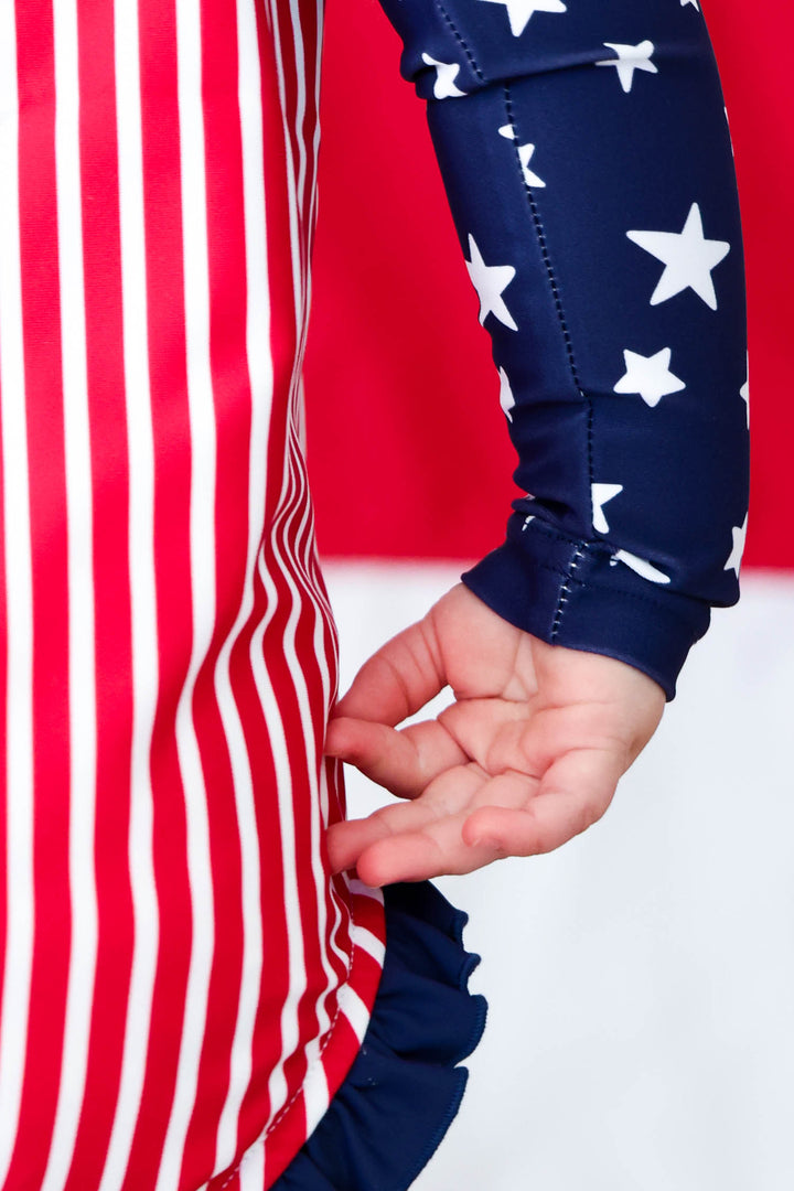 Stars & Stripes Party kids long sleeve rash guard with front zipper detail view 7 | 4th of July kids swim | Caden Lane