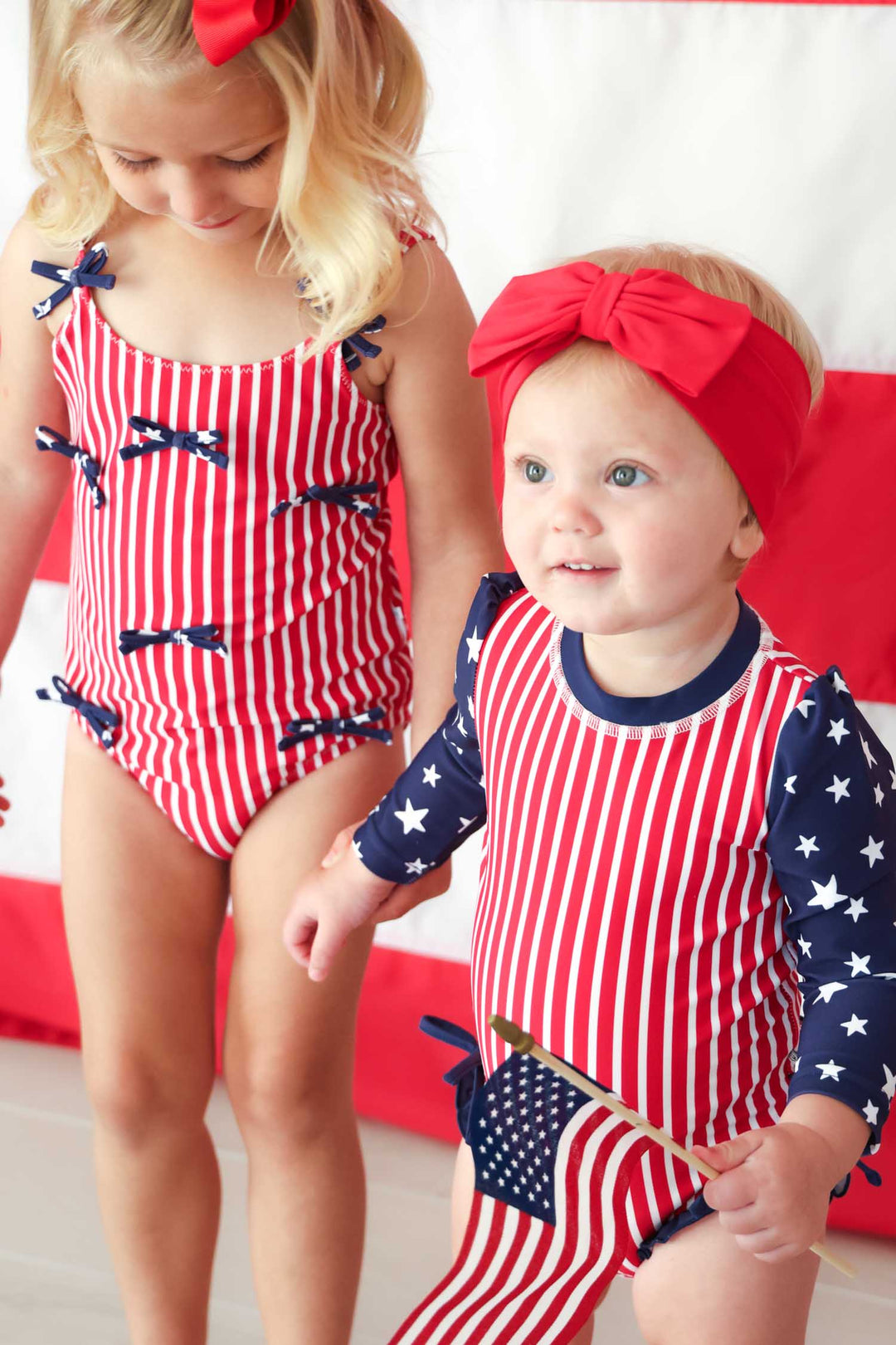 Stars & Stripes Party baby girl rash guard with ruffle bottom detail view 10 | 4th of July kids swim | Caden Lane