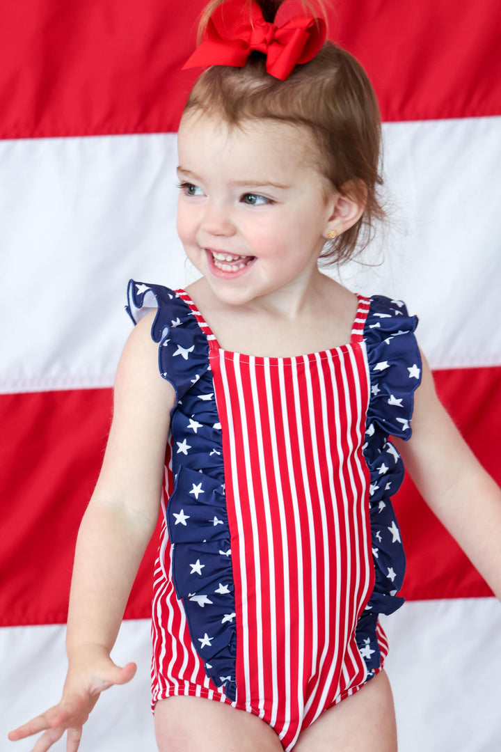 Stars & Stripes Party baby girl double ruffle bow back one piece swimsuit view 8 | 4th of July swim | Caden Lane