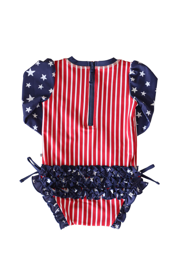 Stars & Stripes Party baby girl rash guard with ruffle bottom detail view 6 | 4th of July kids swim | Caden Lane