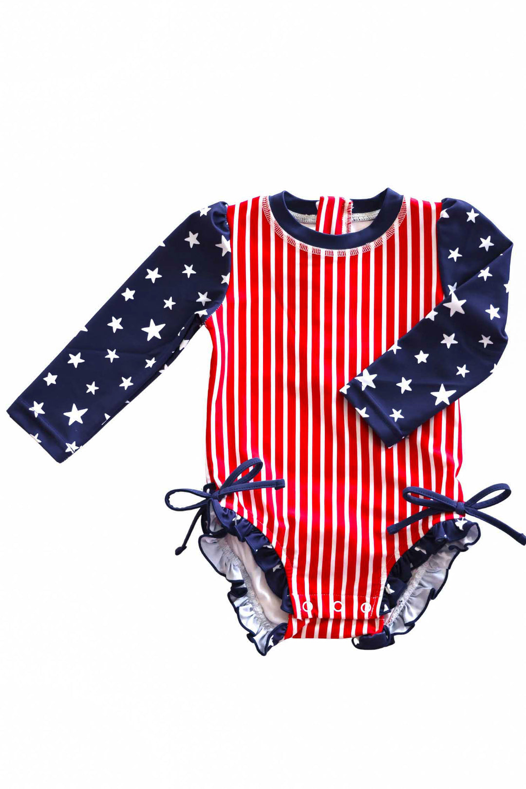 Stars & Stripes Party baby girl rash guard with ruffle bottom | American flag-inspired print | family matching 4th of July swim | Caden Lane