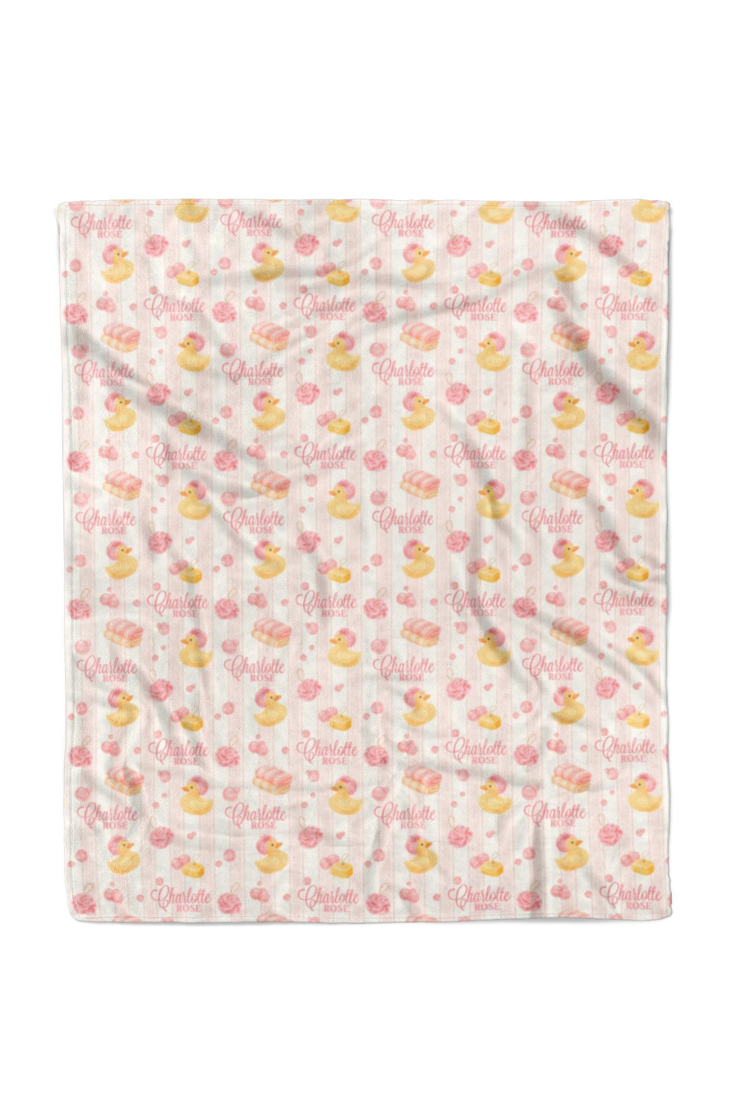 Child smiling and holding 50x60 pink Bubble Duckies personalized blanket with yellow rubber duck and pink rose print