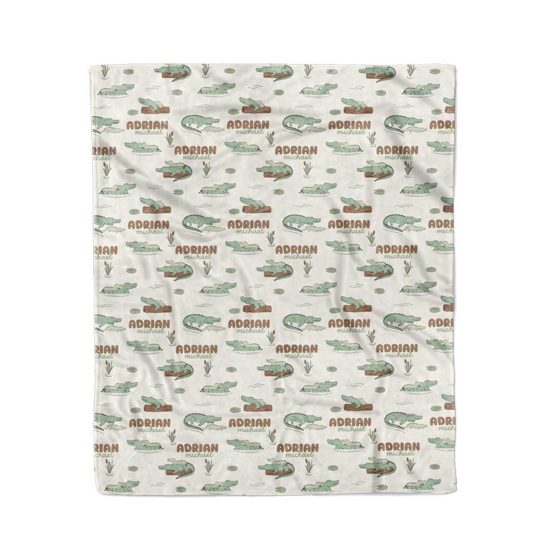 tan blanket with alligators floating logs personalized with name for kids 