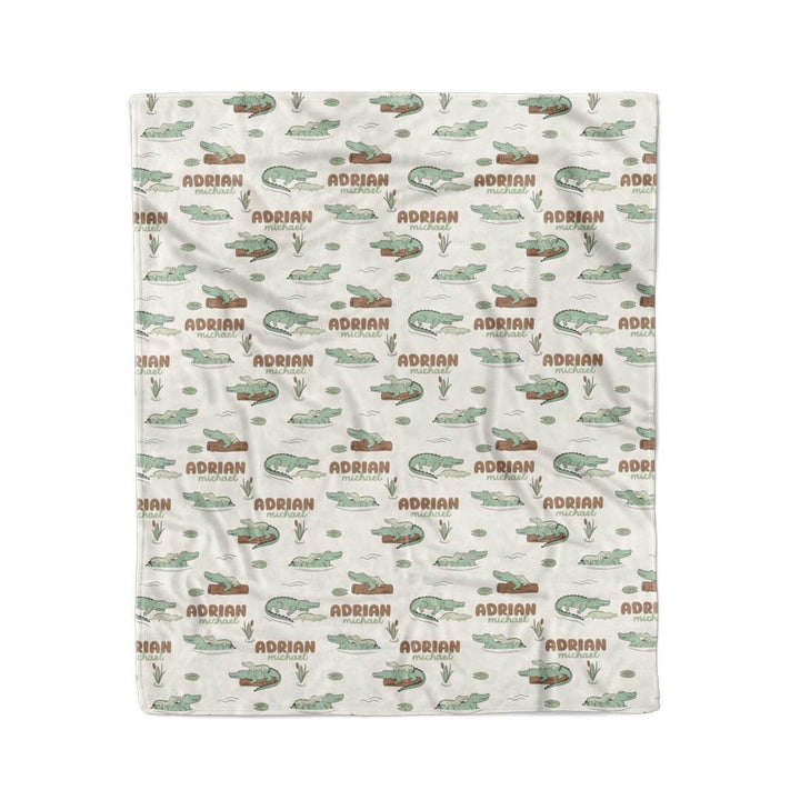 tan blanket with alligators floating logs personalized with name for kids 