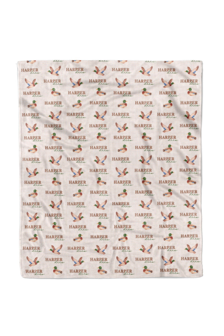 Full-size personalized little mallard duck print blanket laid flat showing complete repeating mallard duck and name pattern, 50x60 size