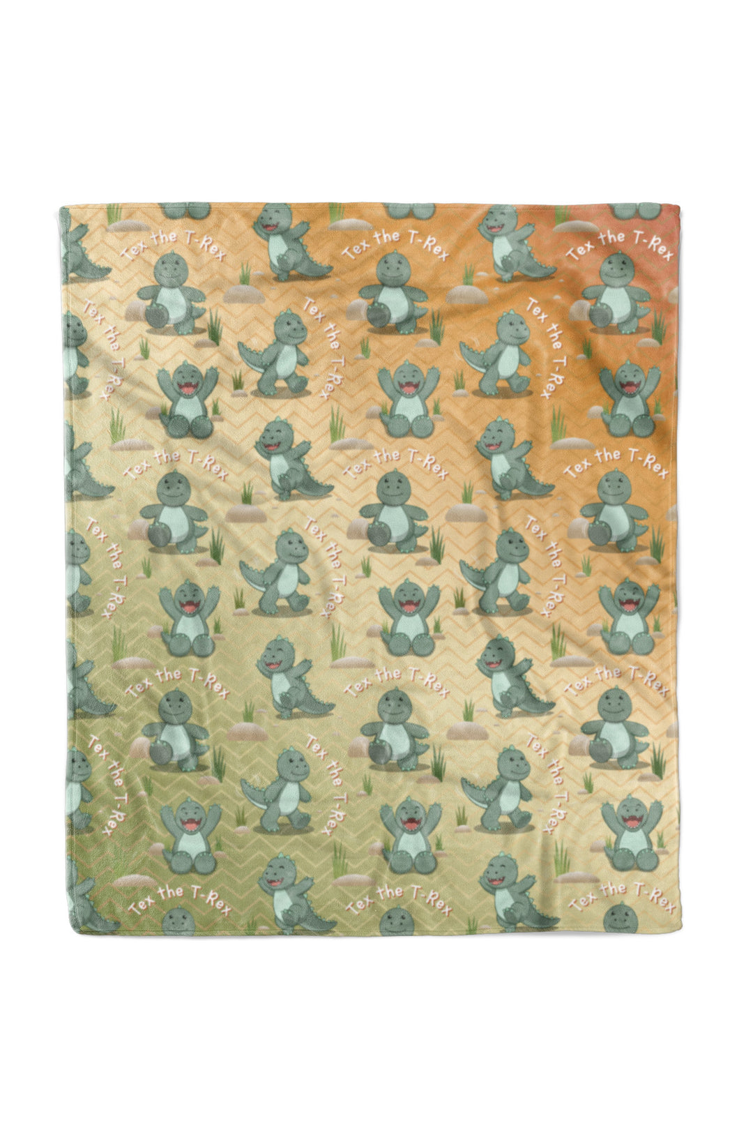 Caden Lane personalized "Tex the T-Rex" fleece baby blanket in an orange-to-green ombre chevron pattern, featuring a repeating print of a smiling green dinosaur in different poses with "Tex the T-Rex" text arched throughout