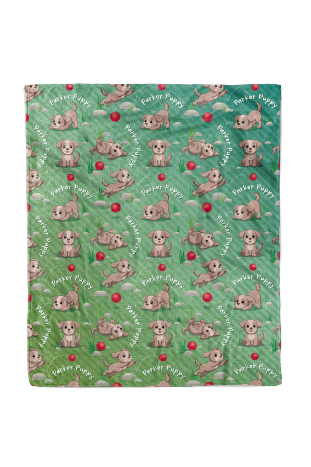 Flat lay of a Caden Lane personalized "Parker Puppy" fleece baby blanket in a green ombre pattern, covered in a repeating print of a playful puppy character with a red ball and "Parker Puppy" text arched throughout