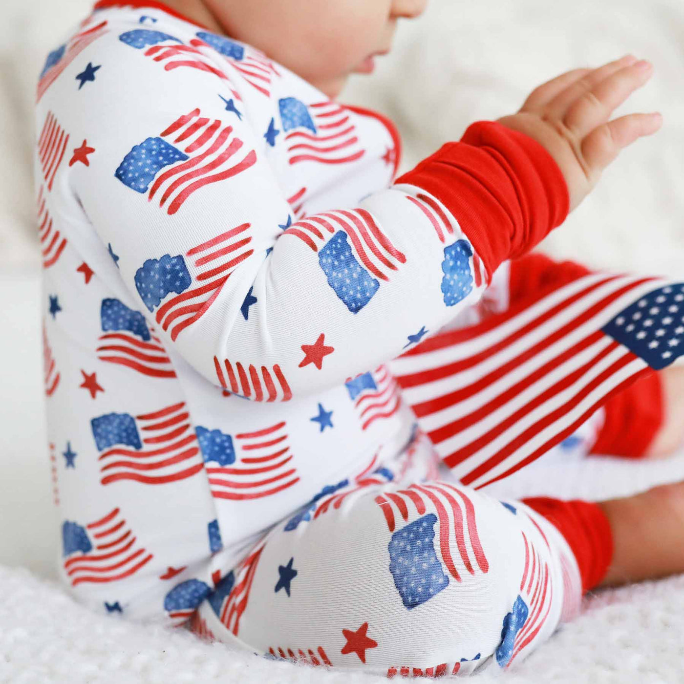 baby zipper romper with flags for the 4th of july 